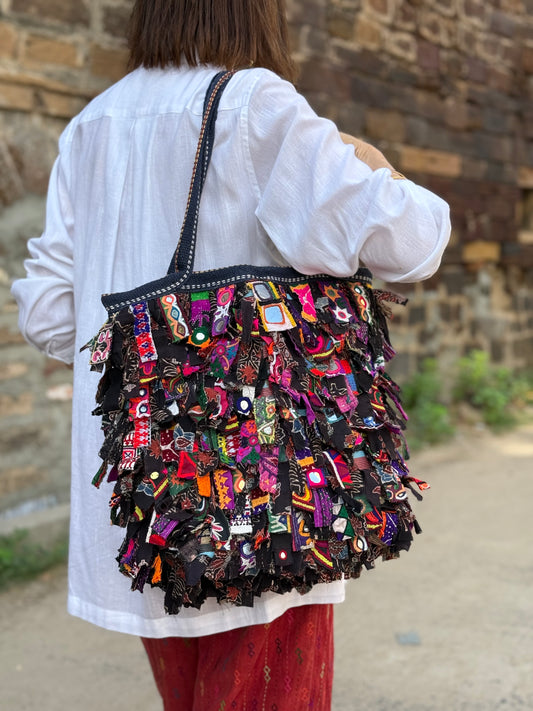 Up-cycled shaggy embroidery bag