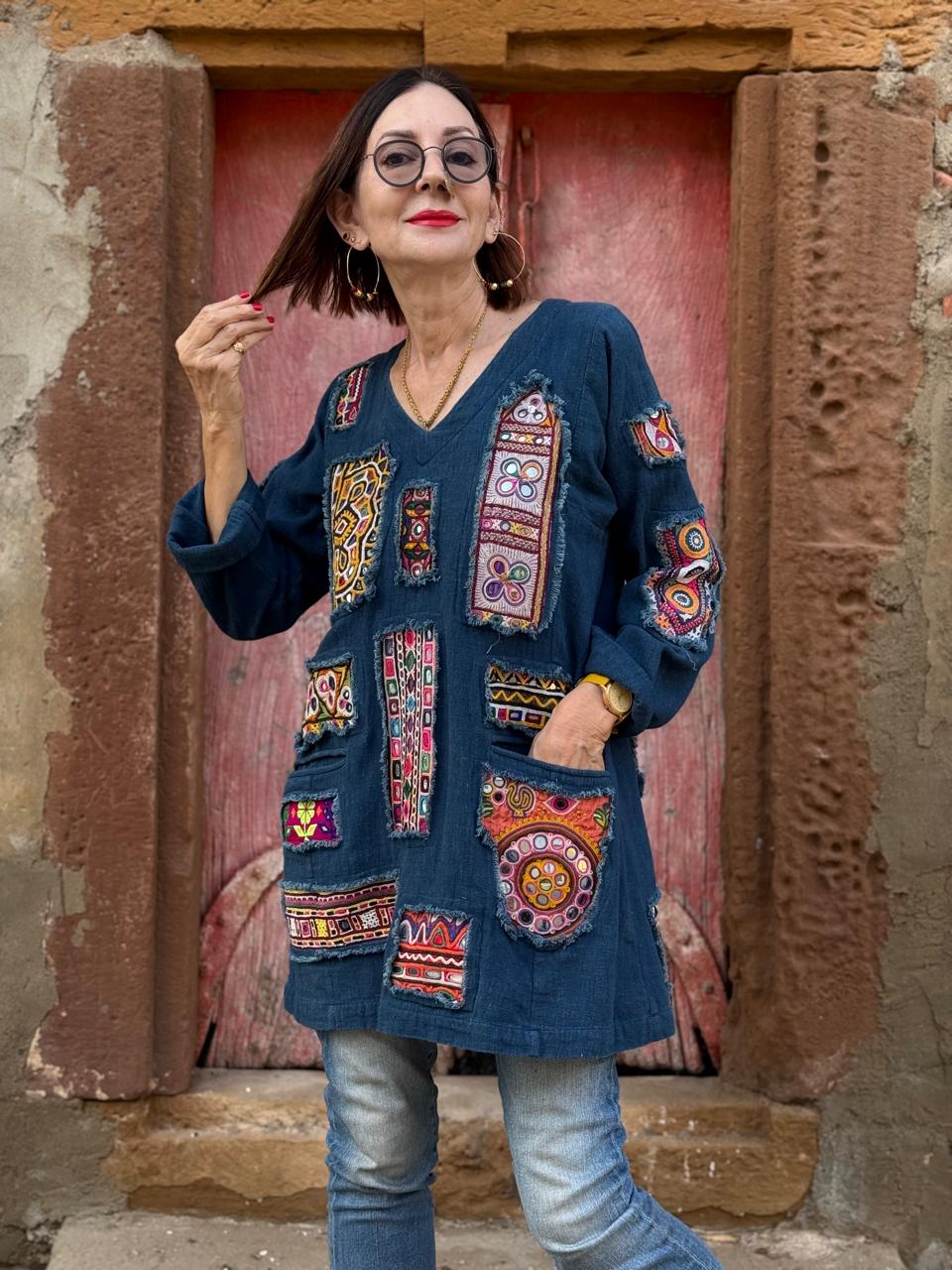 Array of Kutch – Indigo Handloom Tunic, showcasing a dazzling mix of mirror work patches