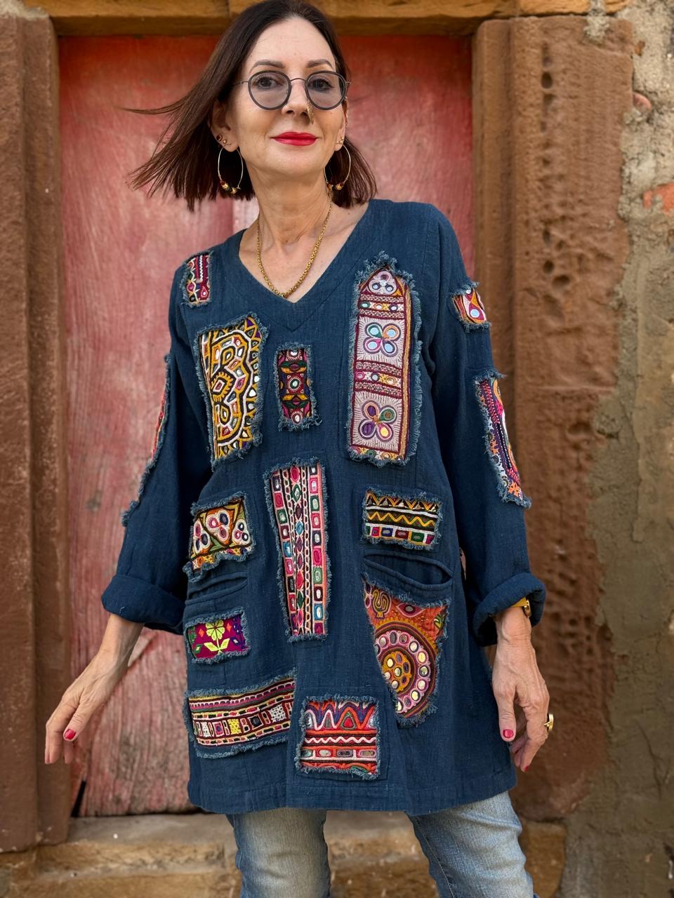 Array of Kutch – Indigo Handloom Tunic, showcasing a dazzling mix of mirror work patches