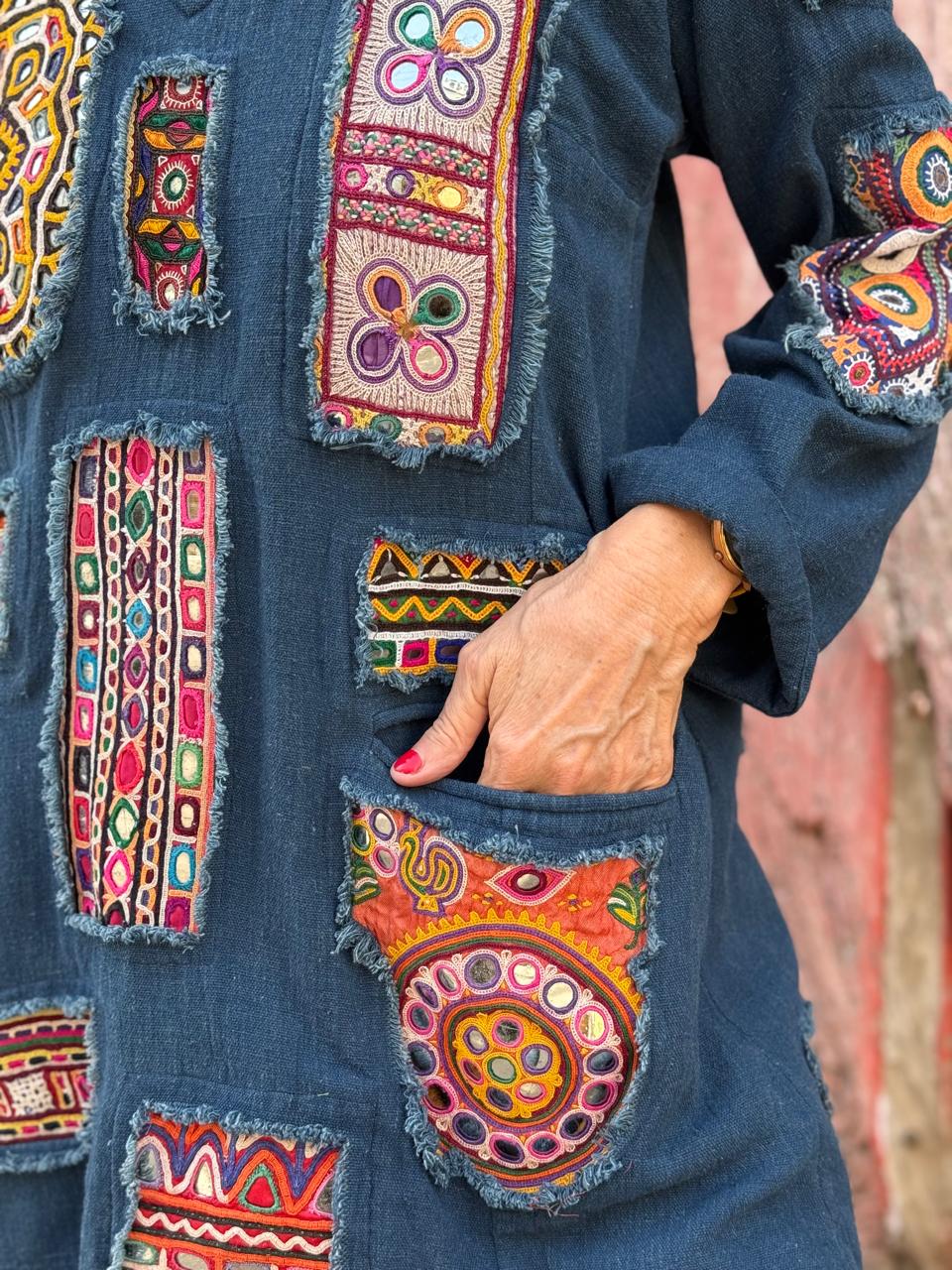 Array of Kutch – Indigo Handloom Tunic, showcasing a dazzling mix of mirror work patches
