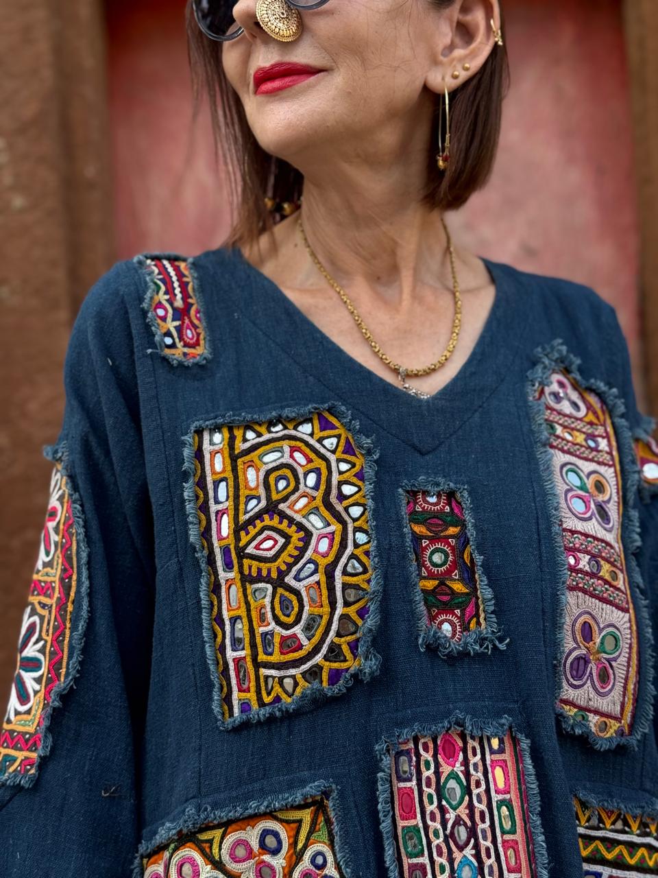 Array of Kutch – Indigo Handloom Tunic, showcasing a dazzling mix of mirror work patches