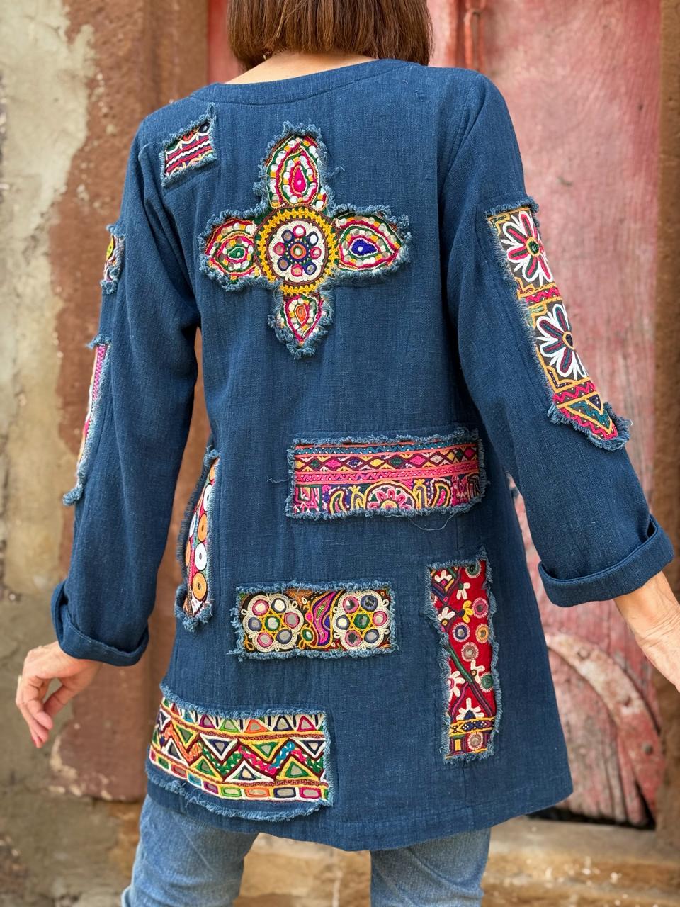 Array of Kutch – Indigo Handloom Tunic, showcasing a dazzling mix of mirror work patches