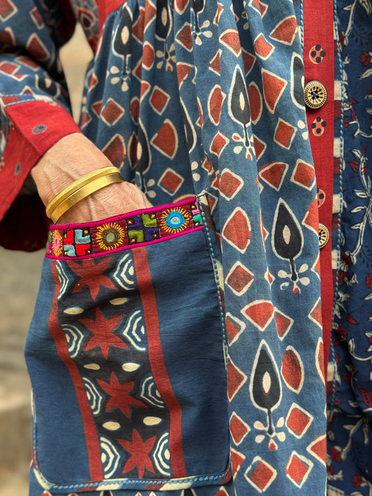 Cotton Ajrakh in a kaftan tunic of indigo block prints featuring stripes, polka dots and hand embroidery