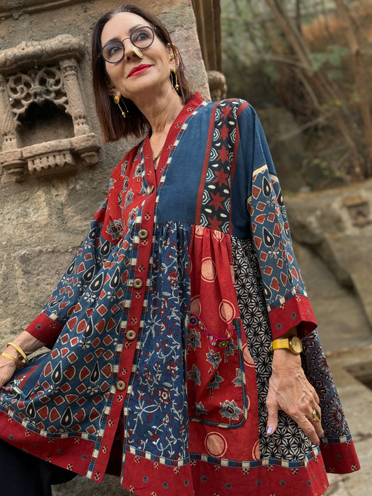 Cotton Ajrakh in a kaftan tunic of indigo block prints featuring stripes, polka dots and hand embroidery