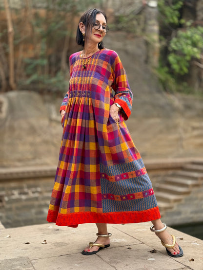 Check cotton dress with designer patchwork and smocked embroidery bodice.