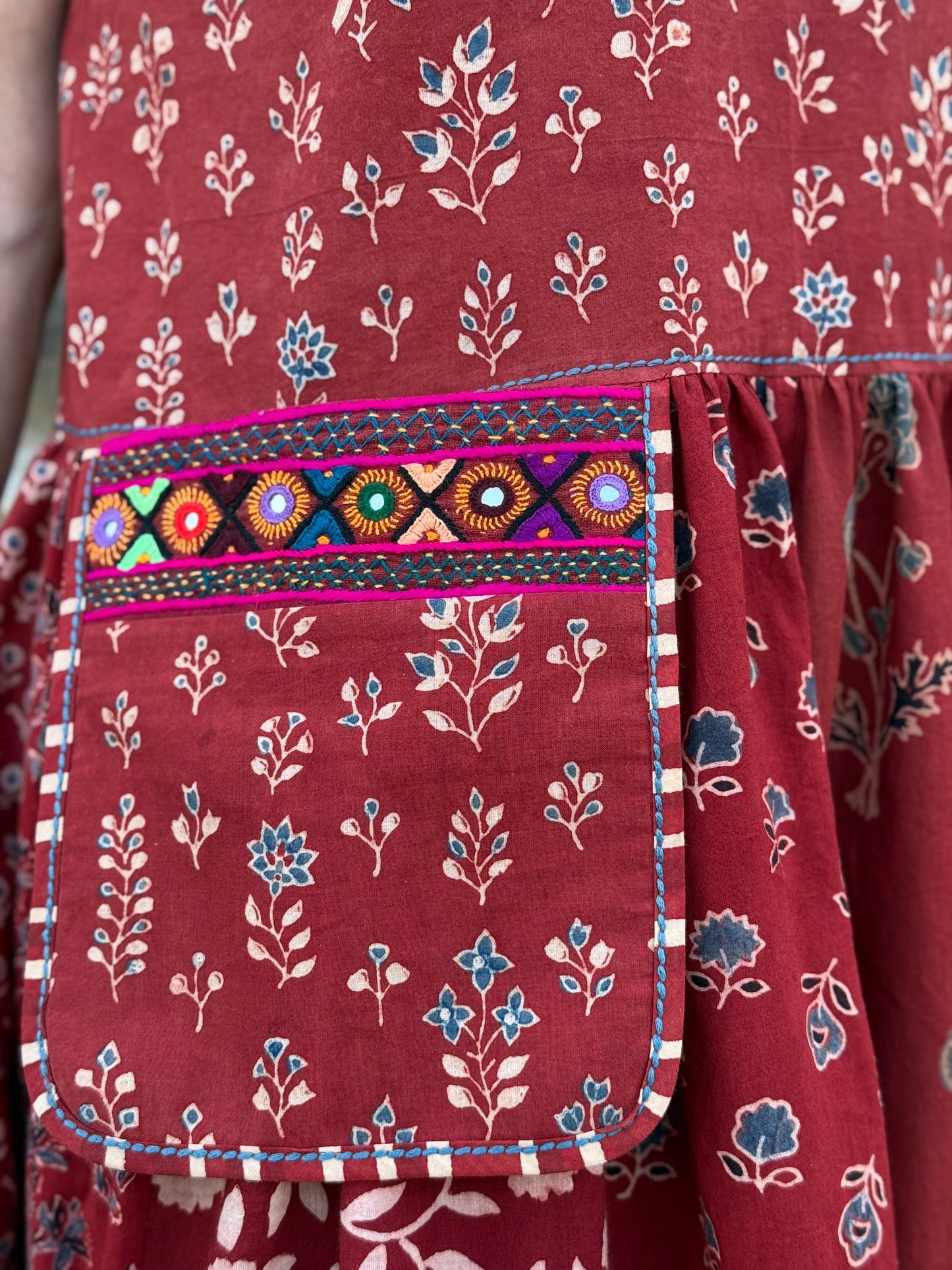 Sleeveless jumper dress with Kutch hand embroidery on the pocket