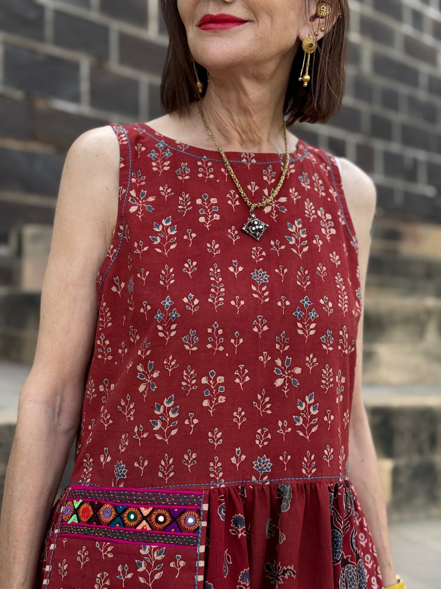 Sleeveless jumper dress with Kutch hand embroidery on the pocket